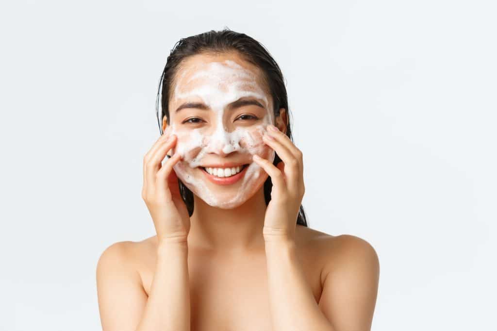 Skincare, women beauty, hygiene and personal care concept. Close-up of beautiful asian female